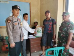 Bhabinkamtibmas Polsek Cikijing Monitoring Penyaluran BPNT di Desa Binaan