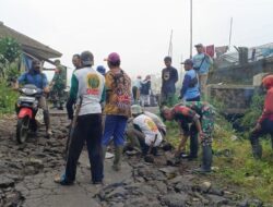 Bersama Warga, Anggota Koramil Talaga Gelar Karya Bakti Perbaikan Jalan Rusak