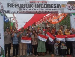 Babinkamtibmas Polsek Lemahsugih Hadiri Pemasangan Bendera Merah Putih 1000 Meter untuk HUT RI ke-79
