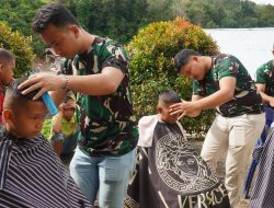 Kodim 0210/Tapanuli Utara Gelar Cukur Rambut Gratis untuk Anak Pengungsi Pascabencana