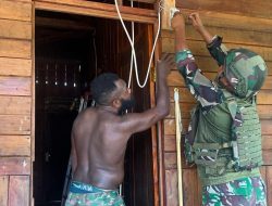 Binter Listrik Berdaya Satgas Yonif 521/DY Bantuan Teknis dan Instalasi di Papua