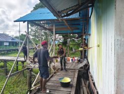 Satgas Yonif 123/Rajawali Pos Suator Bersama Masyarakat Gelar Aksi Bersih Gereja Sambut Kenaikan Isa Almasih